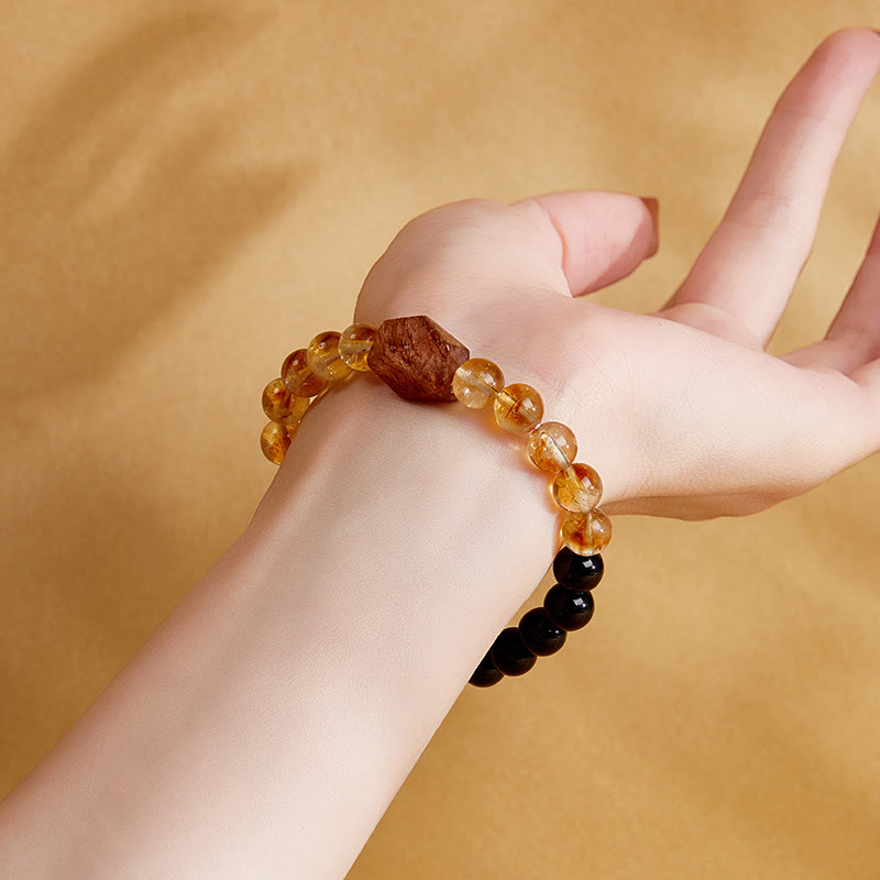 Bracciale Buddha Stones con cristalli di ossidiana nera naturale e citrino Super Seven Strength