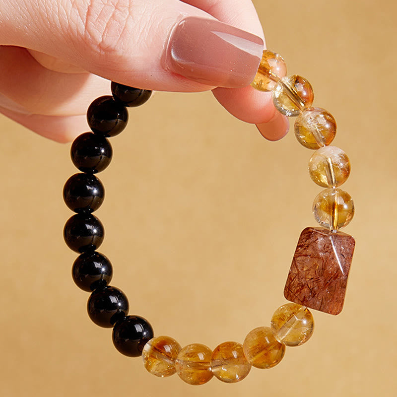 Bracciale Buddha Stones con cristalli di ossidiana nera naturale e citrino Super Seven Strength