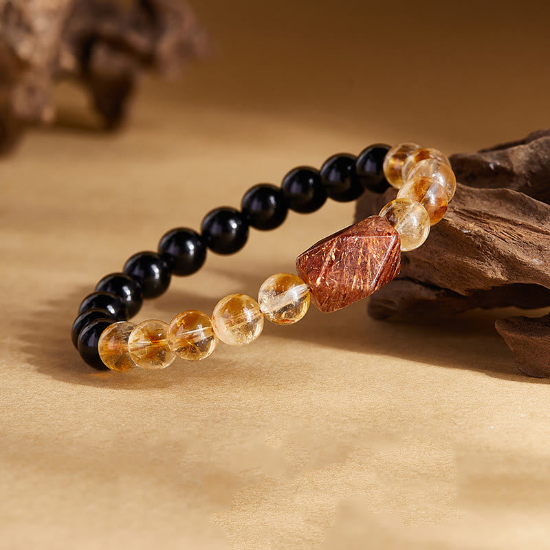 Bracciale Buddha Stones con cristalli di ossidiana nera naturale e citrino Super Seven Strength