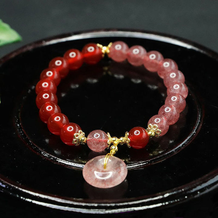 Bracciale Buddha Stones con quarzo fragola e agata rossa, fibbia della pace e fortuna positiva