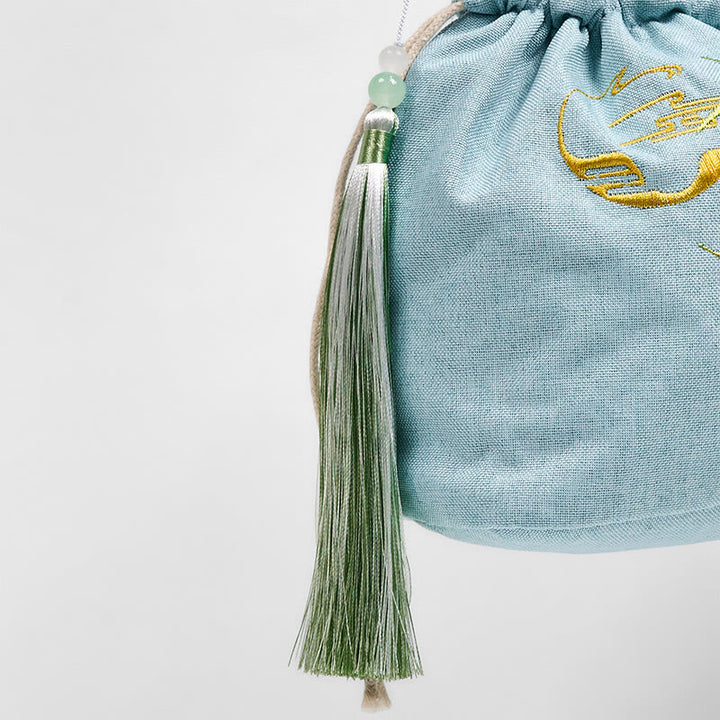 Borsa a tracolla in lino e cotone di bambù verde ricamata con Buddha Stones