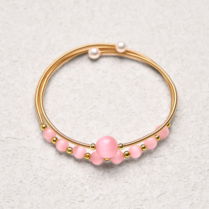 Bracciale rigido in metallo con supporto per occhio di gatto rosa in rame riempito d'oro 14K Buddha Stones