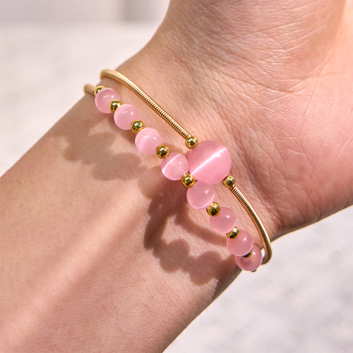 Bracciale rigido in metallo con supporto per occhio di gatto rosa in rame riempito d'oro 14K Buddha Stones