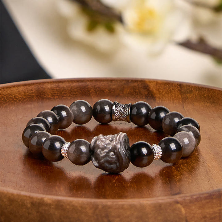 Bracciale di protezione della danza del leone in ossidiana lucida e argento naturale Buddha Stones
