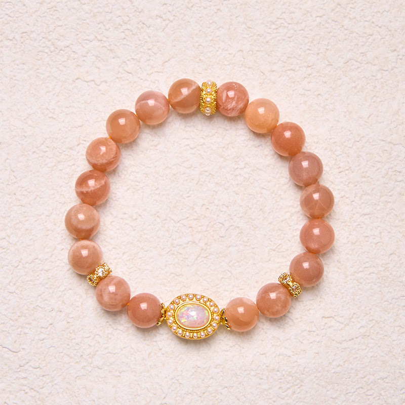 Braccialetto regolabile e rilassante Buddha Stones in pietra di luna naturale color pesca