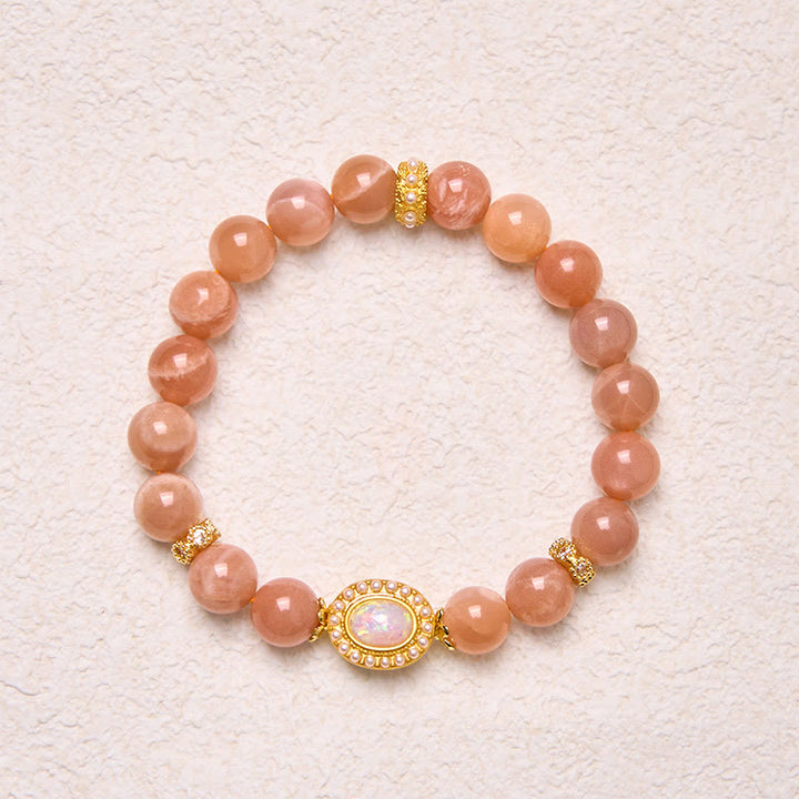 Braccialetto regolabile e rilassante Buddha Stones in pietra di luna naturale color pesca