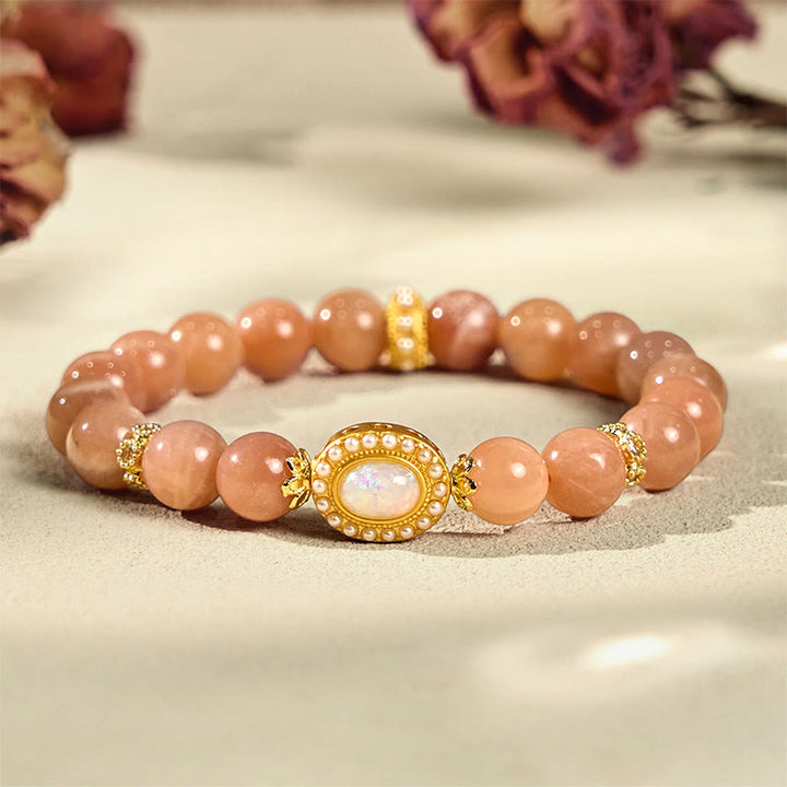 Braccialetto regolabile e rilassante Buddha Stones in pietra di luna naturale color pesca