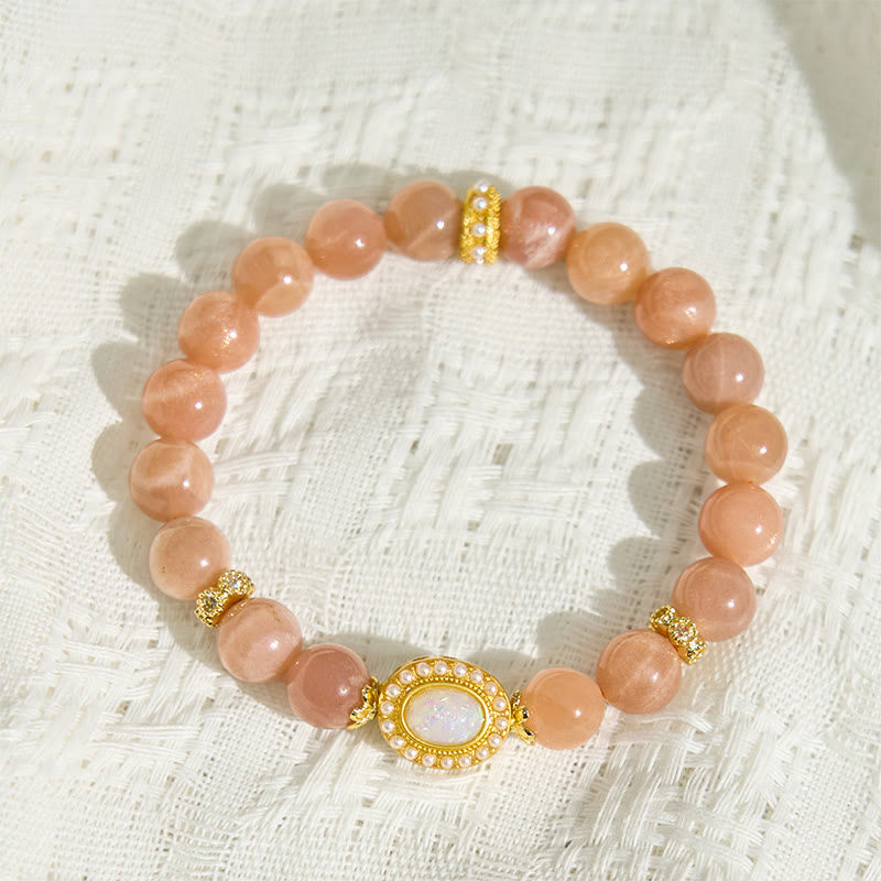 Braccialetto regolabile e rilassante Buddha Stones in pietra di luna naturale color pesca