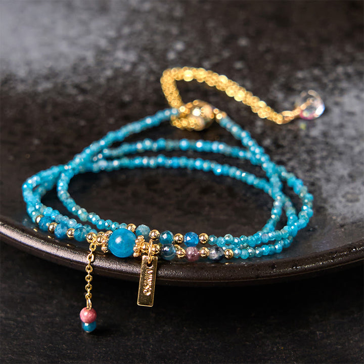 Bracciale triplo giro creativo in rame placcato oro 14k con perline ultrasottili in apatite naturale da 3 mm di Buddha Stone