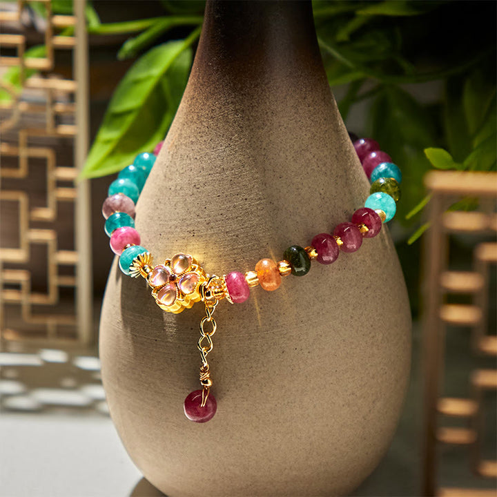 Bracciale dell'amore con fiore a quadrifoglio e tormalina Buddha Stones