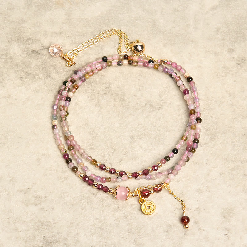 Bracciale della saggezza con moneta di tormalina colorata e perline irregolari da 2,5 mm Buddha Stones