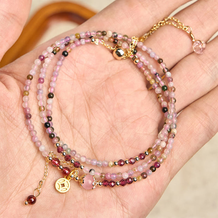 Bracciale della saggezza con moneta di tormalina colorata e perline irregolari da 2,5 mm Buddha Stones