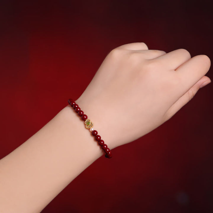 Braccialetto di perle di cinabro e zucca con Buddha Stones e perle di benedizione - image 3