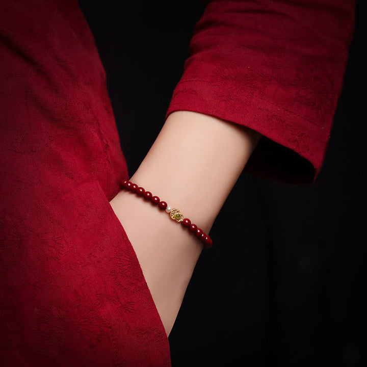 Braccialetto di perle di cinabro e zucca con Buddha Stones e perle di benedizione - image 4