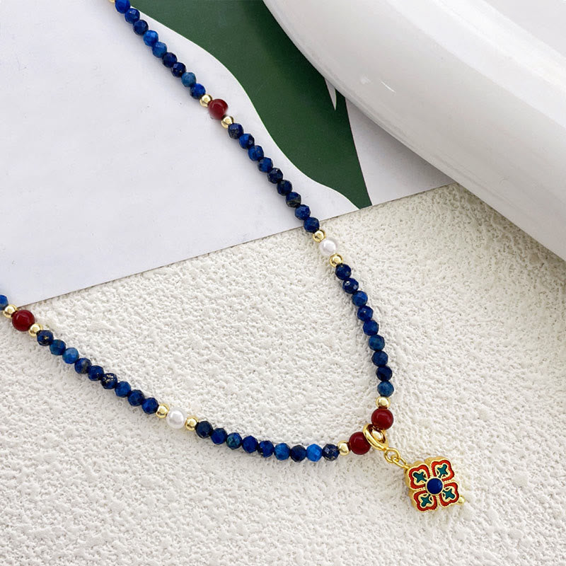 Collana con ciondolo positivo in perle di lazurite e pietre Buddha Stones - image 2