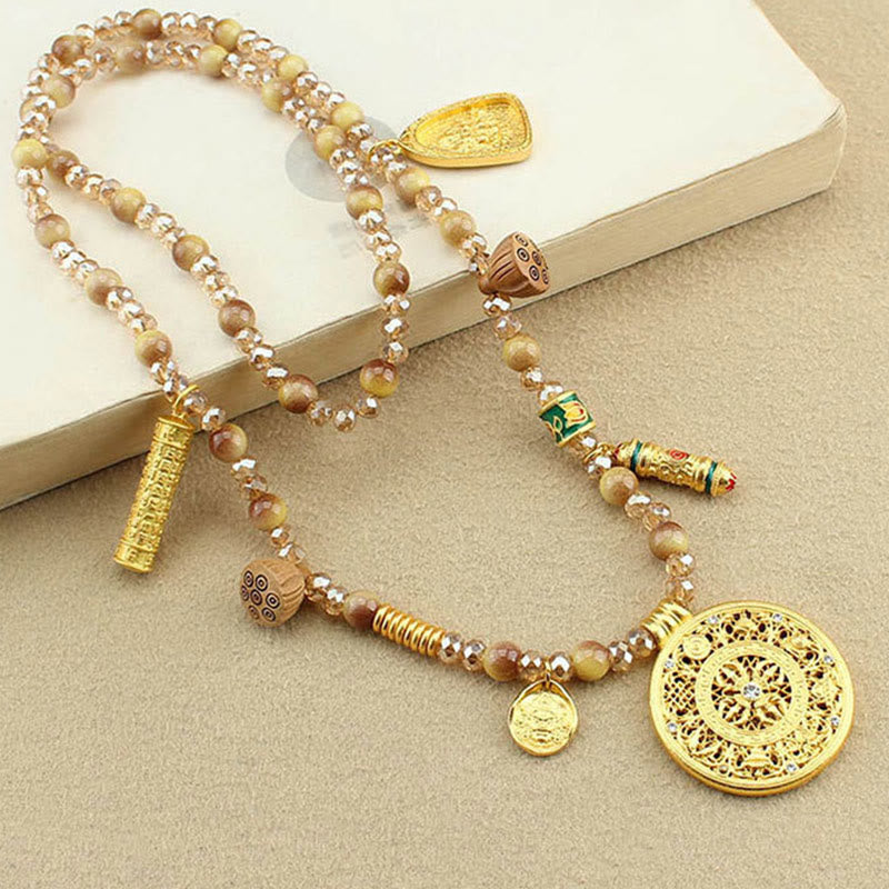 Collana con ciondolo in perle di occhio di tigre dorato, piastra rotonda tibetana con Buddha Stones e loto - image 3