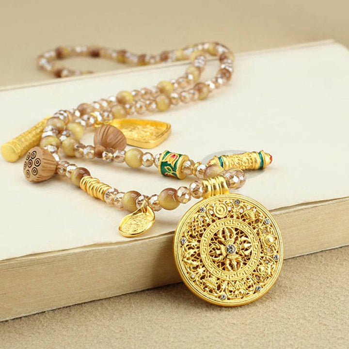 Collana con ciondolo in perle di occhio di tigre dorato, piastra rotonda tibetana con Buddha Stones e loto - Piatto rotondo Eight Treasures - image 1