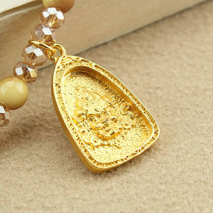 Collana con ciondolo in perle di occhio di tigre dorato, piastra rotonda tibetana con Buddha Stones e loto - image 12