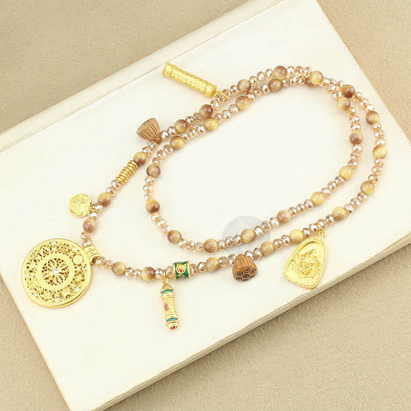 Collana con ciondolo in perle di occhio di tigre dorato, piastra rotonda tibetana con Buddha Stones e loto - image 11