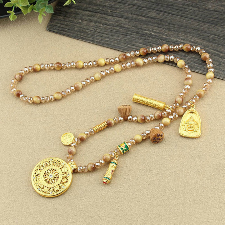 Collana con ciondolo in perle di occhio di tigre dorato, piastra rotonda tibetana con Buddha Stones e loto - image 4