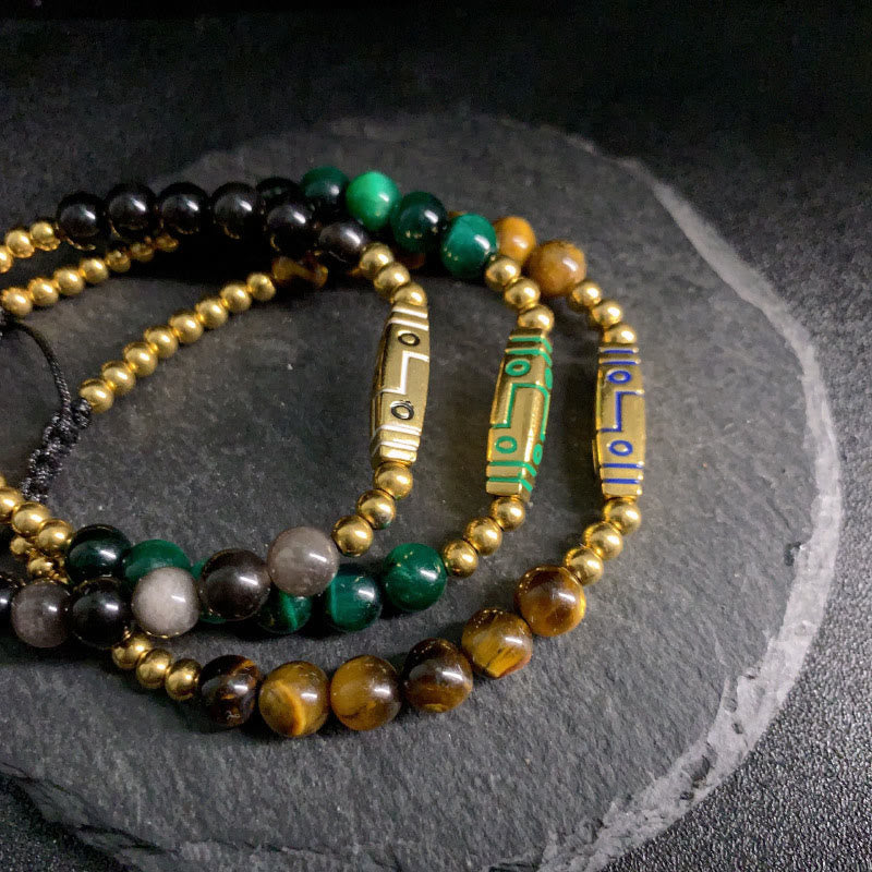 Braccialetto con perline di coraggio in occhio di tigre con motivo a osso e Buddha Stones - image 14