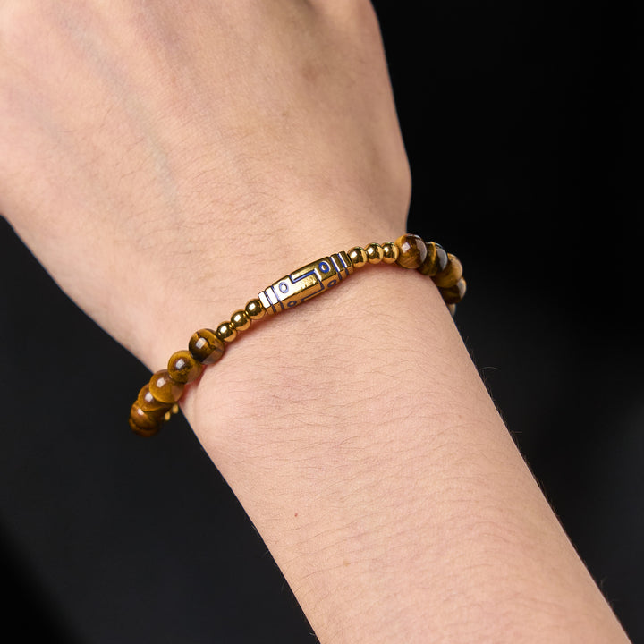 Braccialetto con perline di coraggio in occhio di tigre con motivo a osso e Buddha Stones - image 3