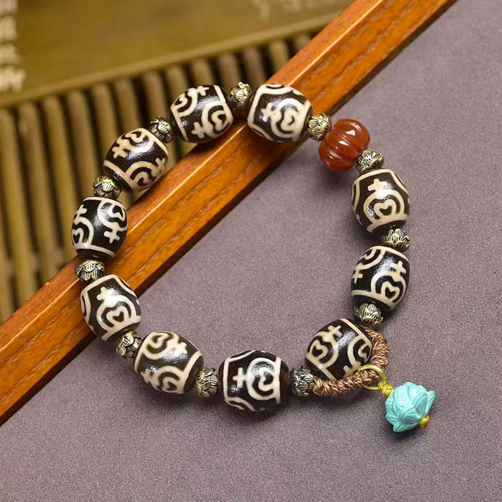 Buddha Stones, Vaso del Tesoro del Fulmine Tibetano, Perlina Dzi, Braccialetto del Potere della Foresta del Signore dei Cadaveri - Perlina Dzi a forma di vaso di loto (circonferenza del polso: 16-17 cm) - image 9