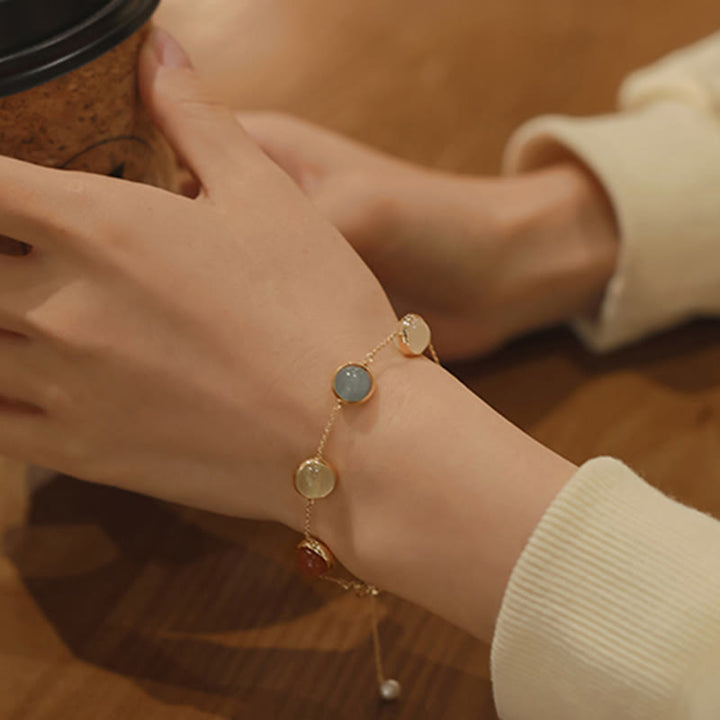 Bracciale Buddha Stones con cristalli colorati, ametista, quarzo fragola e bilanciamento - image 17