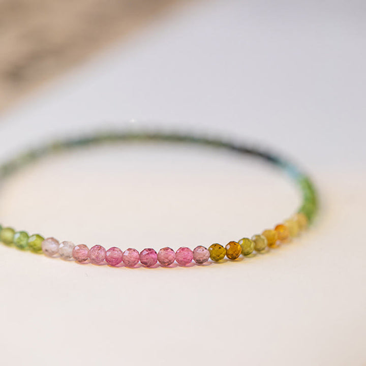 Braccialetto positivo con perline ultrasottili in tormalina naturale Buddha Stones da 2,5 mm - image 1