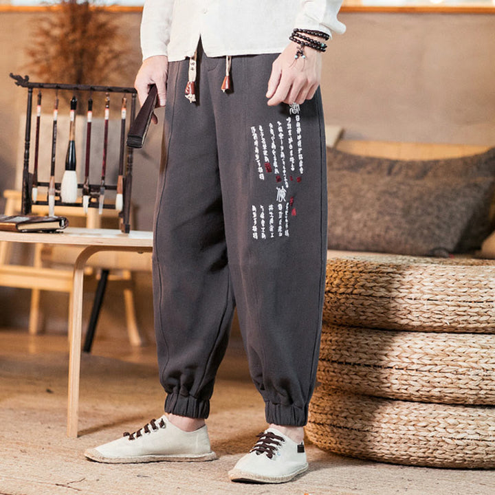 Pantaloni da uomo in cotone con tasche e motivo a caratteri cinesi ricamati con Buddha Stones - image 2