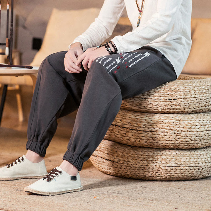 Pantaloni da uomo in cotone con tasche e motivo a caratteri cinesi ricamati con Buddha Stones - image 8