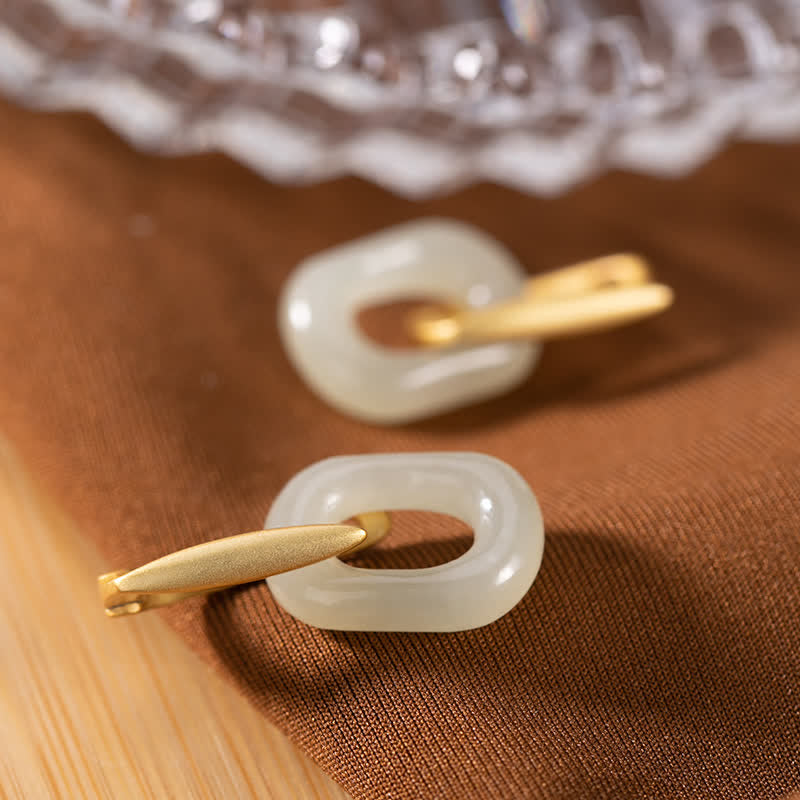 Orecchini Buddha Stones in argento sterling 925 con giada bianca rotonda e benedizione della felicità