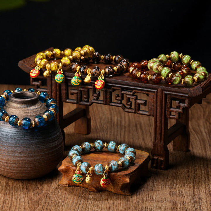 Buddha Stones Oro Deglutizione Bestia Famiglia Ciondolo Liuli Perline di Vetro Braccialetto della Fortuna