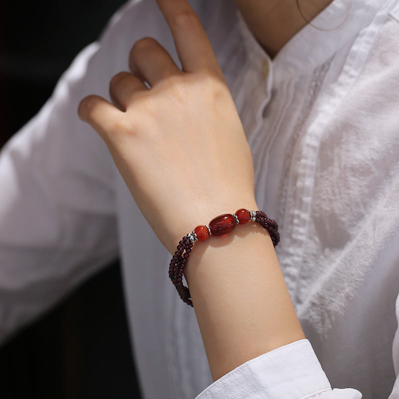 Bracciale Buddha Stones con triplo strato di protezione in agata rossa granata naturale