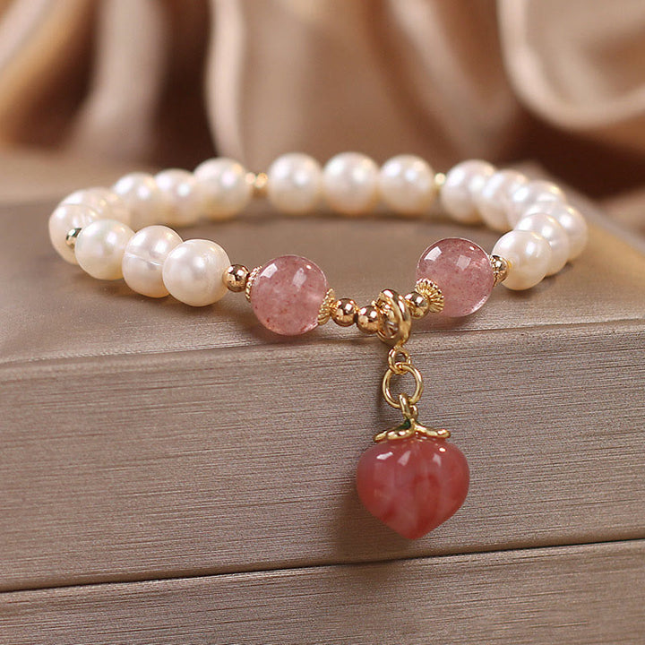 Bracciale con ciondolo a forma di cuore, amore, saggezza, perle naturali, quarzo fragola e pesca Buddha Stones