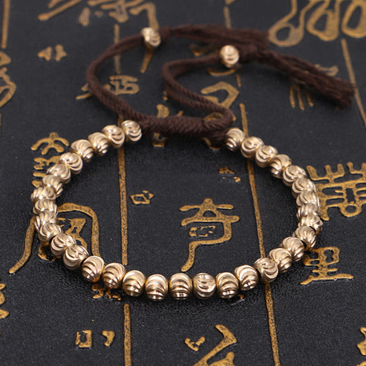 Braccialetto portafortuna in perline di rame tibetano fatto a mano Buddha Stones