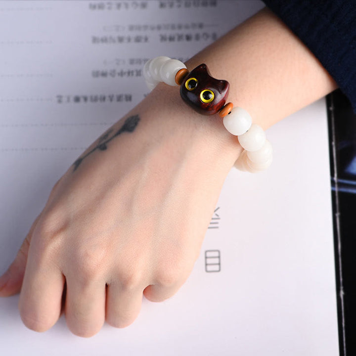 Buddha Stones Semi di Bodhi naturali Piccola foglia Sandalo rosso Legno di ebano Carino braccialetto della saggezza del gatto fortunato - image 7