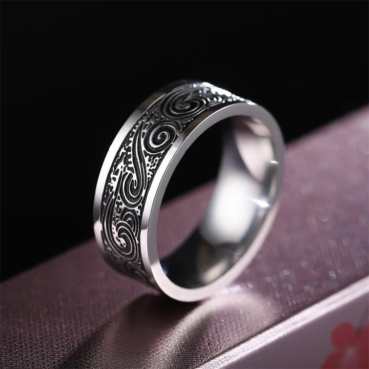 Anello in acciaio al titanio con motivo inciso a onde vintage e nuvole di buon auspicio