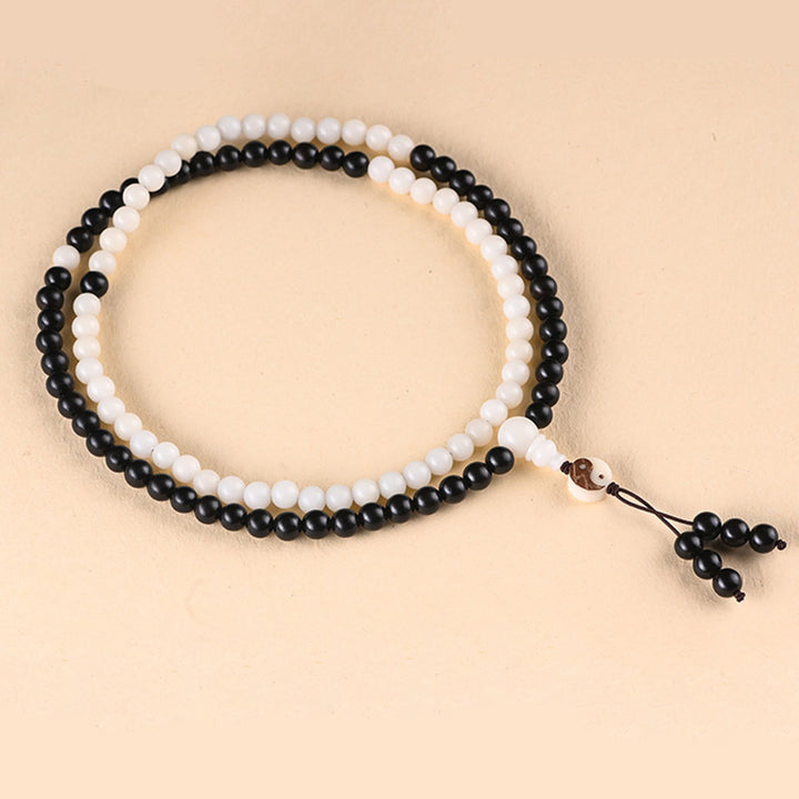 Collana Mala con protezione YinYang in ebano e Buddha Stones