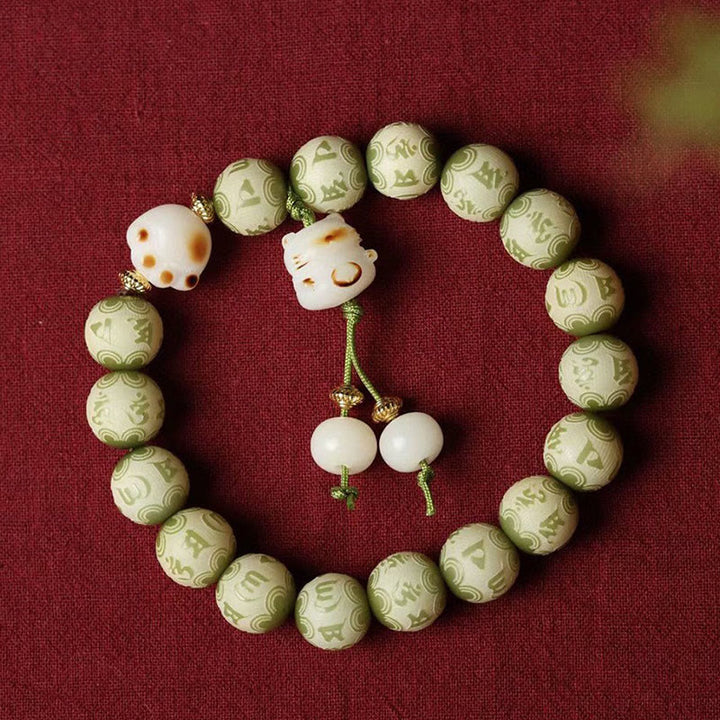 Buddha Stones Semi di Bodhi verdi Zampa di gatto Om Mani Padme Hum Braccialetto della saggezza inciso - image 3