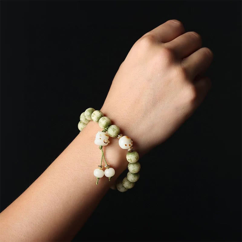 Buddha Stones Semi di Bodhi verdi Zampa di gatto Om Mani Padme Hum Braccialetto della saggezza inciso - image 6