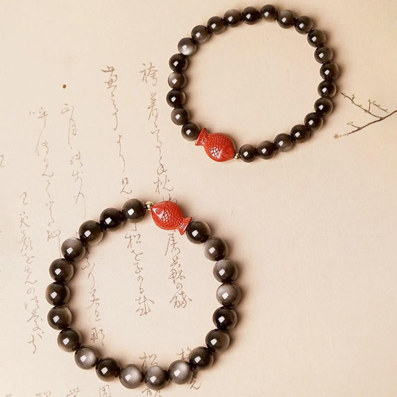 Braccialetto di protezione lenitiva con pesce koi, ossidiana, cinabro, argento naturale e Buddha Stones