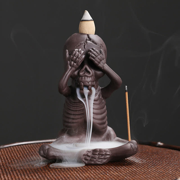 Buddha Stones Piccolo teschio Fantasma Argilla viola Fontana di fumo a riflusso Bruciatore di incenso della pace Decorazione