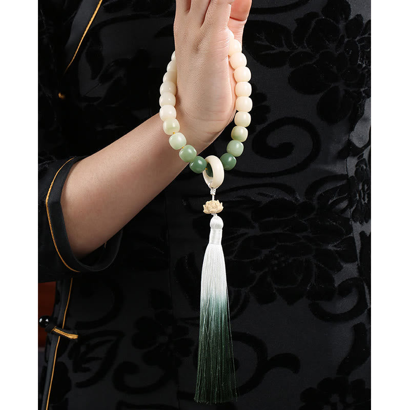 Buddha Stones Naturale Gradiente Bodhi Seed Fortuna Sacchetto di Denaro Loto Saggezza Nappa Polso Mala