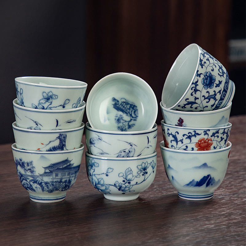 Buddha Stones Paesaggio blu Montagne Loto Gatto carino Padiglioni Magnolia Canna Aironi Tazza da tè in ceramica Piccola tazza da tè Kung Fu