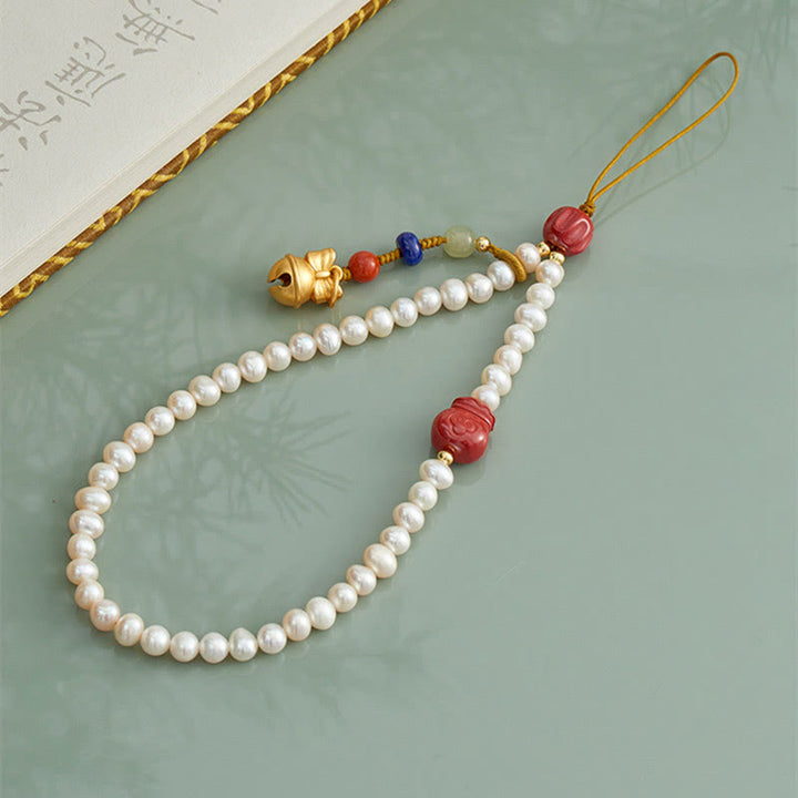 Buddha Stones Perla naturale Cinabro Borsa per soldi Campana Oro Bestia che deglutisce Leone danzante Guarigione Telefono Decorazione appesa