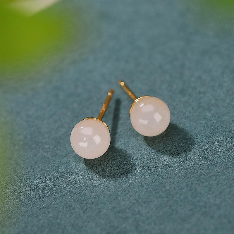 Orecchini a bottone rotondi in giada bianca con Buddha Stones in argento sterling 925