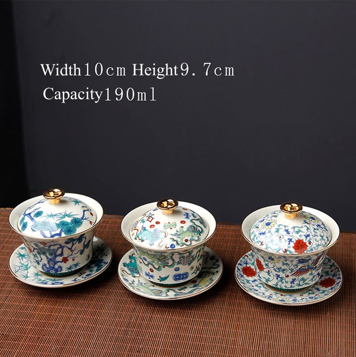 Buddha Stones Retro Prugna Fiore Pino Bambù Fenice Kirin Ceramica Gaiwan Sancai Tazza da tè Kung Fu Tazza da tè e piattino con coperchio