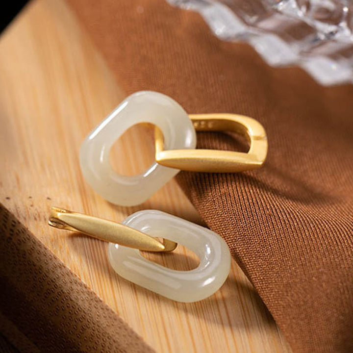 Orecchini Buddha Stones in argento sterling 925 con giada bianca rotonda e benedizione della felicità