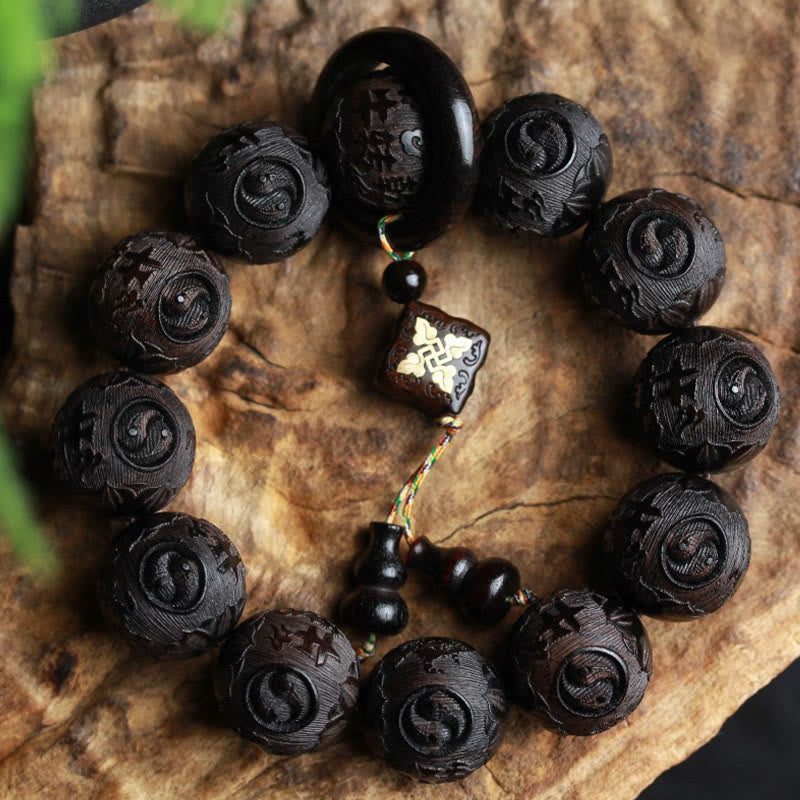 Braccialetto di equilibrio con zucca inciso con carattere cinese Yin Yang in legno di ebano Buddha Stones
